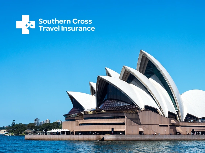 Photograph of Sydney Opera House on a sunny day with Southern Cross Travel Insurance logo